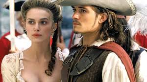 People struggle against the wind and rain in Malmö, Sweden, after a storm reached southern Sweden, Saturday Oct. 4, 2025. (Johan Nilsson/TT via AP)